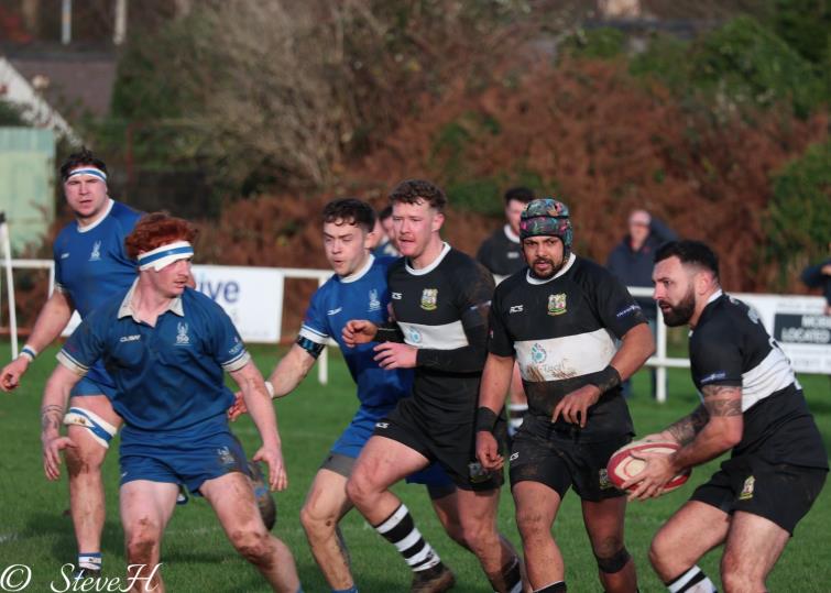 Quins player-coach Craig Barnett looks for a gap